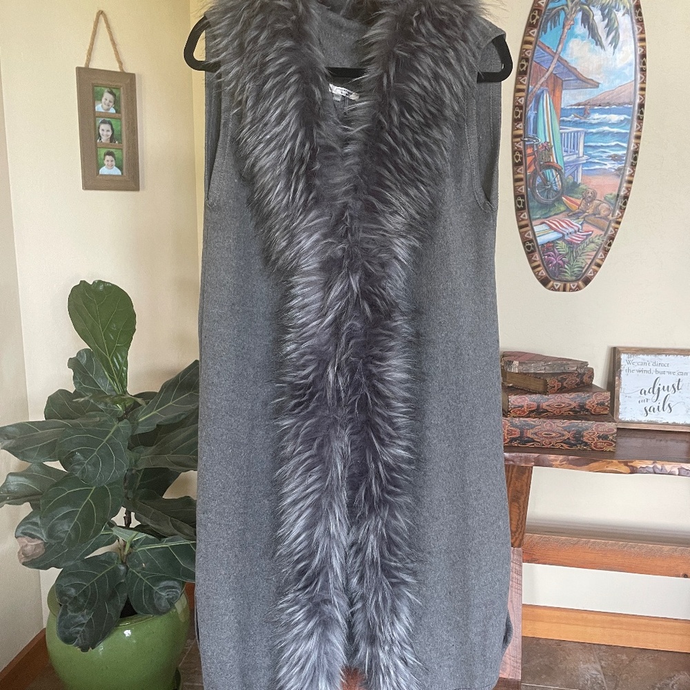 Grey blend long gilet.  The front of the piece is trimmed in a lovely faux fur